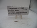 A small metallic nickel barrel pin displayed on a white surface next to a paper label that reads 'Smith & Wesson Revolver K frame Model 15-4 .38 Special Barrel Pin Nickel Part # 152A Used Part Old Style USA GUNS AND GEAR'.