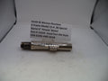 A used metal barrel component for a Smith & Wesson revolver, displayed on a white surface with a handwritten label card behind it.