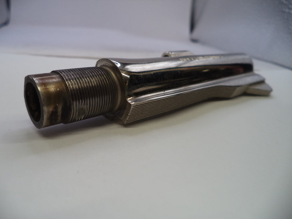 A vintage metallic bicycle fork, likely from a Harley-Davidson or similar cruiser motorcycle, featuring a threaded tube on one end and a polished chrome splined handlebar interface on the other, resting on a white surface.
