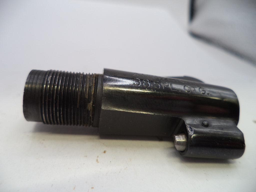 A close-up of a dark metal mechanical component with a threaded cylindrical section and a small protruding pin, photographed on a plain light background.