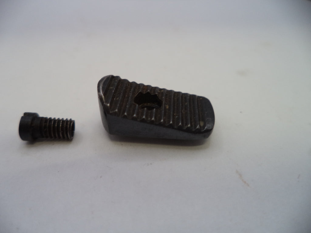 A small black metal hardware component, consisting of a textured rectangular piece with a central cutout and a separate matching threaded screw, shown on a plain light background.