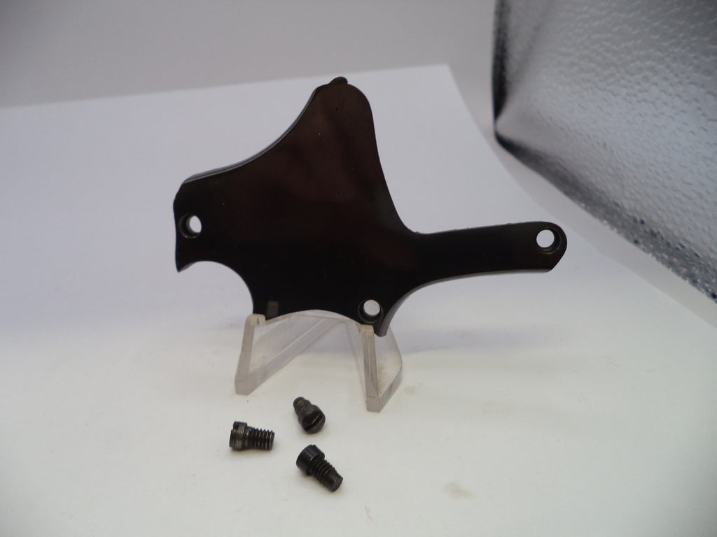 A dark brown wooden mounting bracket with pre-drilled screw holes, displayed on a clear acrylic stand with three small black screws below it, set against a white background.