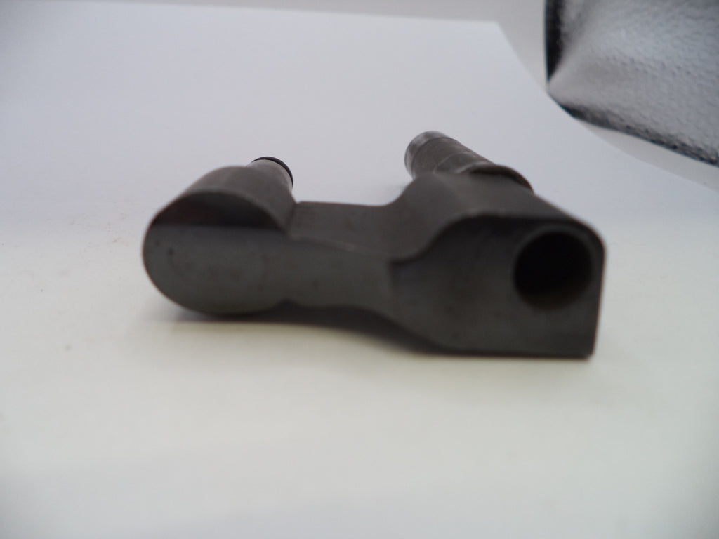 A dark gray cast iron mechanical part, likely a valve stem seat or similar automotive component, shown on a plain white background.