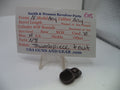 A small dark metal revolver part displayed in front of a handwritten parts list card on a clear stand. The card reads Smith & Wesson Revolver Parts and includes fields for caliber, barrel length, and part details, with USA GUNS AND GEAR .