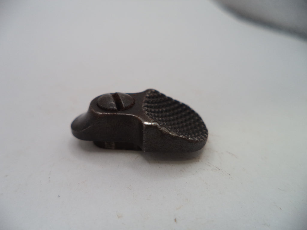 A small dark metal hardware piece with a textured grip and a slotted screw, photographed on a plain light background.