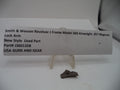 A small used metal part displayed on a clear stand beneath a white label card that reads 'Smith & Wesson Revolver J Frame Model 360 Airweight .357 Magnum Lock Arm New Style Used Part Part# J360132B USA GUNS AND GEAR'.