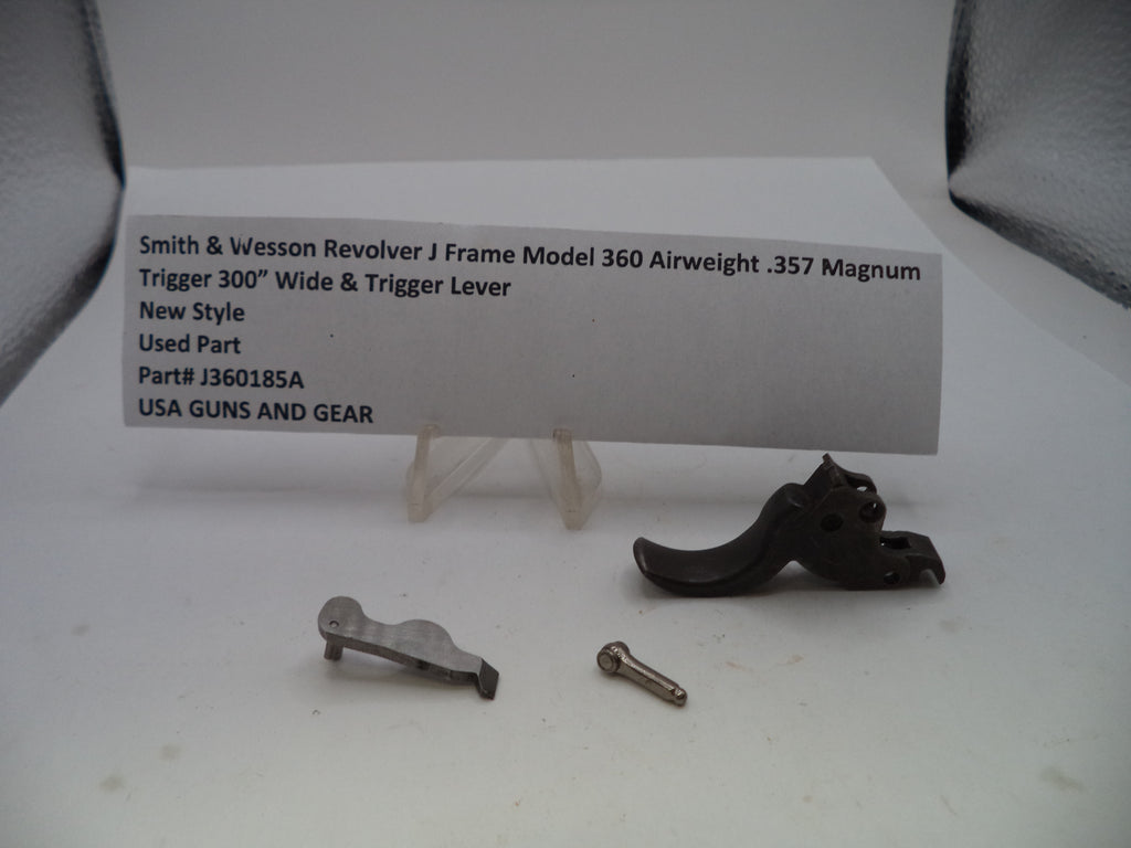 Smith & Wesson revolver J frame trigger lever part for a 360 airweight .357 Magnum, shown as a used part with its mounting screw and a small card displaying part details.