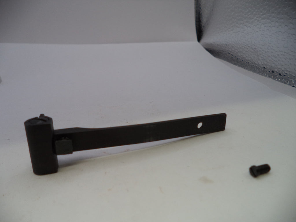 A black metal window blind support bracket with a mounting screw, shown on a white surface.