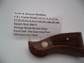 A vintage wood service grip for an S&W L Frame multi model pistol, displaying the model number 10 on the tag.