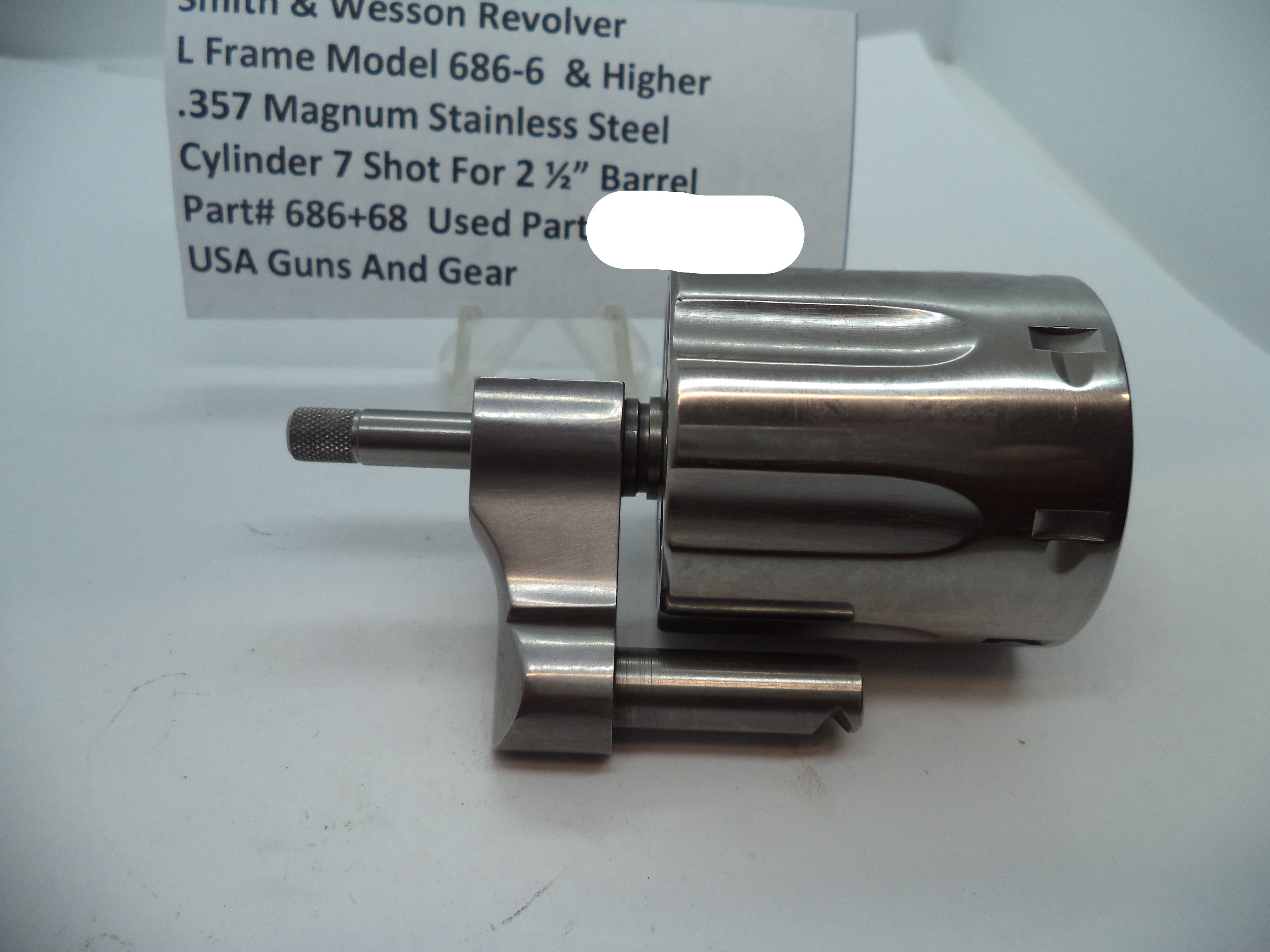 Stainless steel revolver cylinder with model number L686-6 and higher, suitable for 2 1/2 barrel, displayed on a white background with a part number label.
