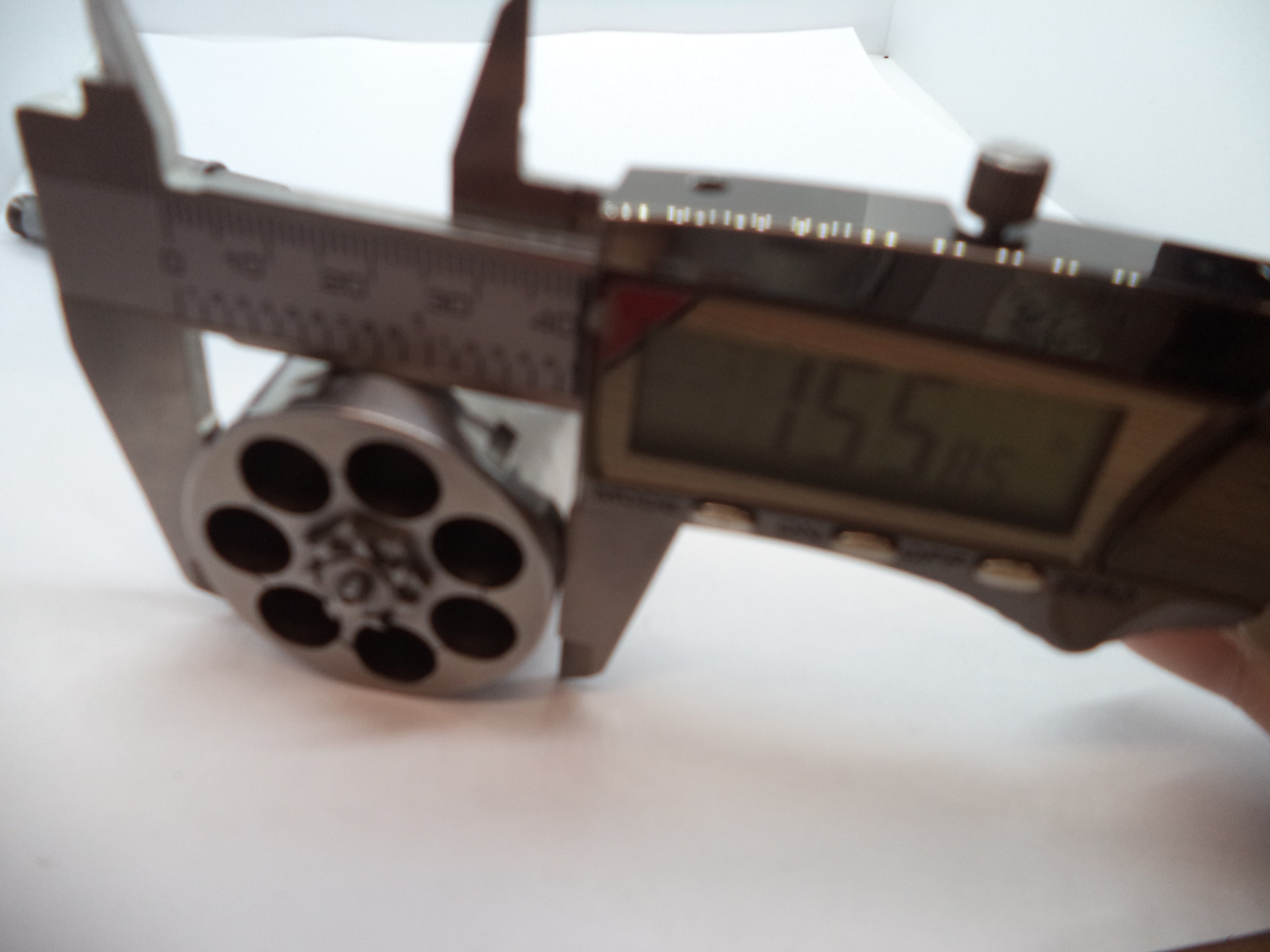 Stainless steel revolver cylinder with model number L686-6 and higher, suitable for 2 1/2 barrel, displayed on a white background with a part number label.