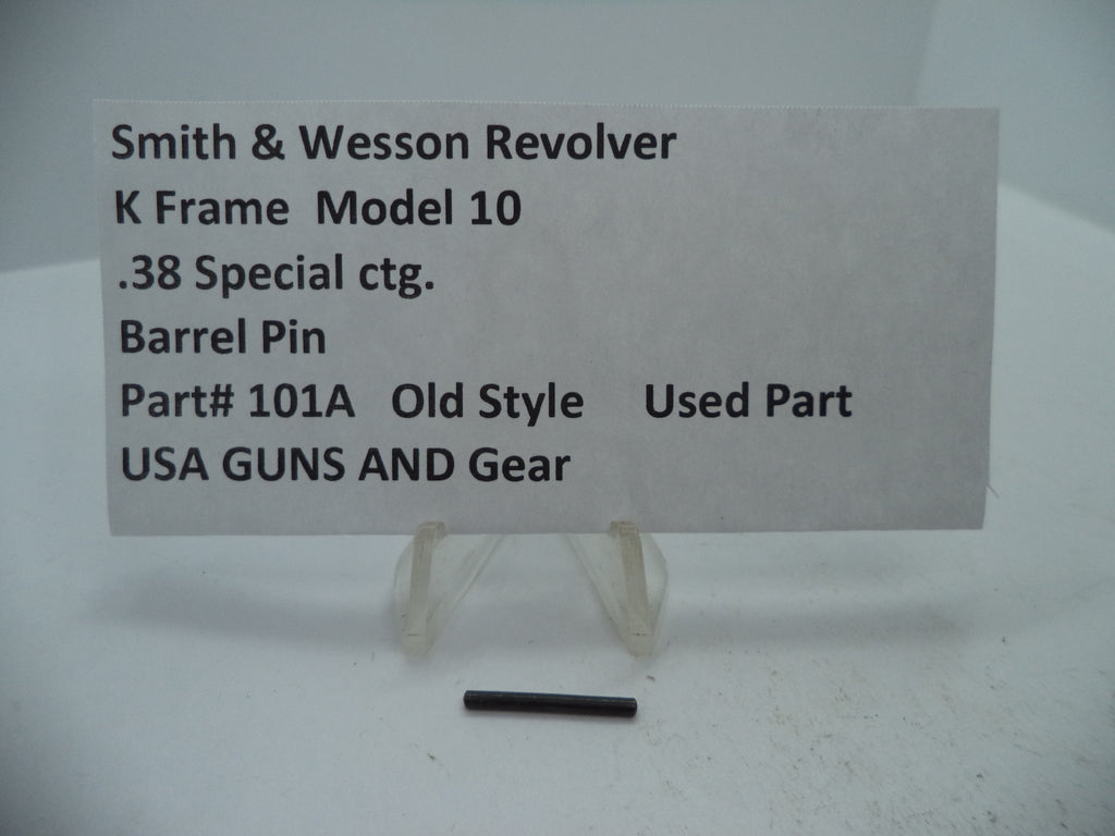 A photo showing a Smith & Wesson K Frame Model 10 revolver with a barrel pin labeled as '38 Special ctg. Part 101A Old Style Used Part'.