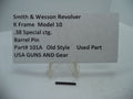 A photo showing a Smith & Wesson K Frame Model 10 revolver with a barrel pin labeled as '38 Special ctg. Part 101A Old Style Used Part'.