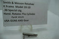 A metal part labeled as a 'K Frame Model 10-10 Hand' cylinder grip for a Smith & Wesson revolver, with the serial number 10129.