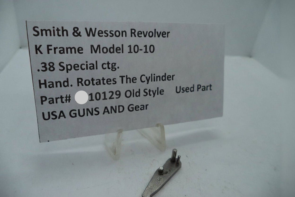 Smith & Wesson revolver part on a stand with descriptive card