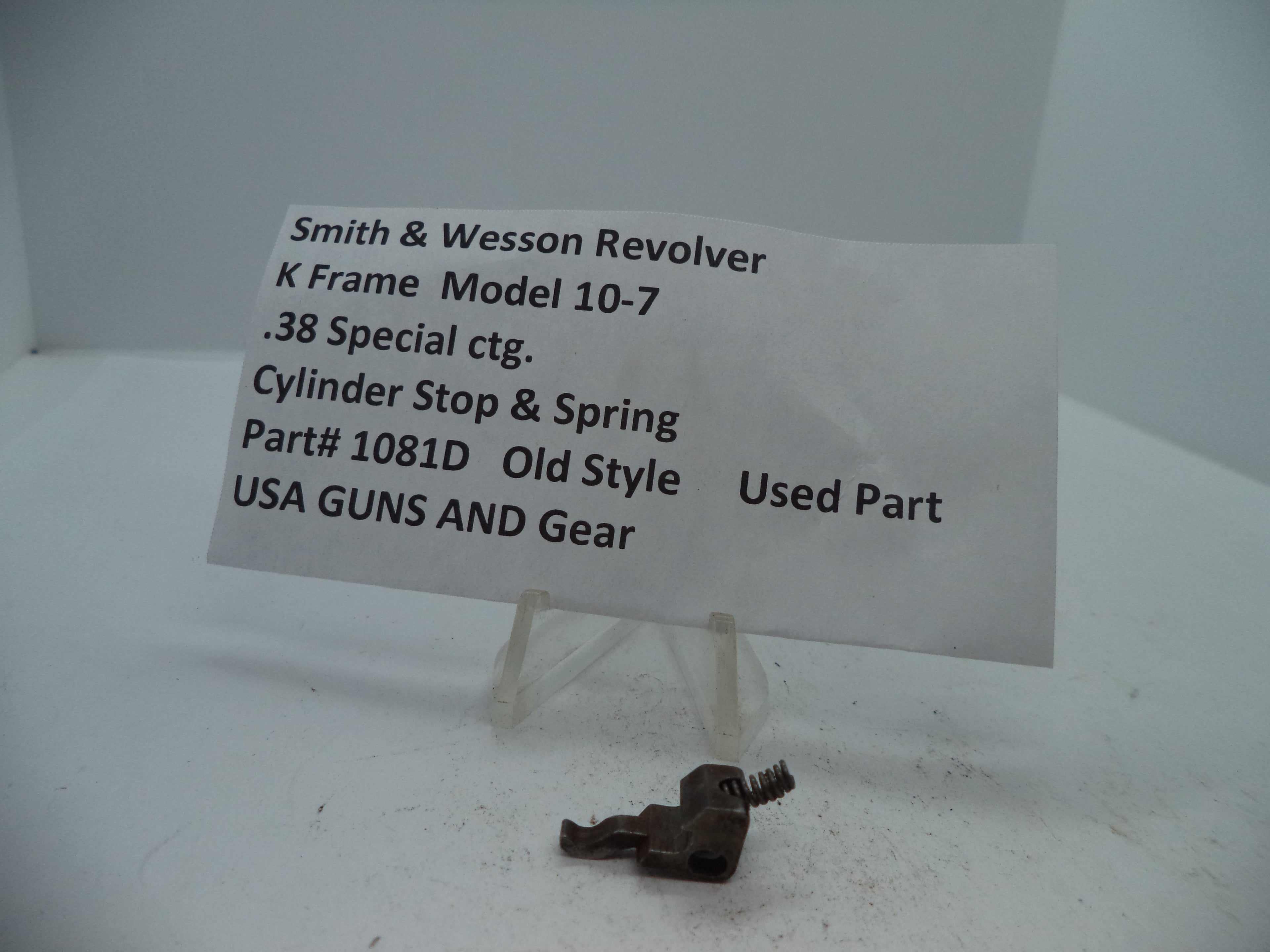 Smith & Wesson K Frame Model 10-7 Cylinder Stop & Spring used gun part displayed on a white background with product label.