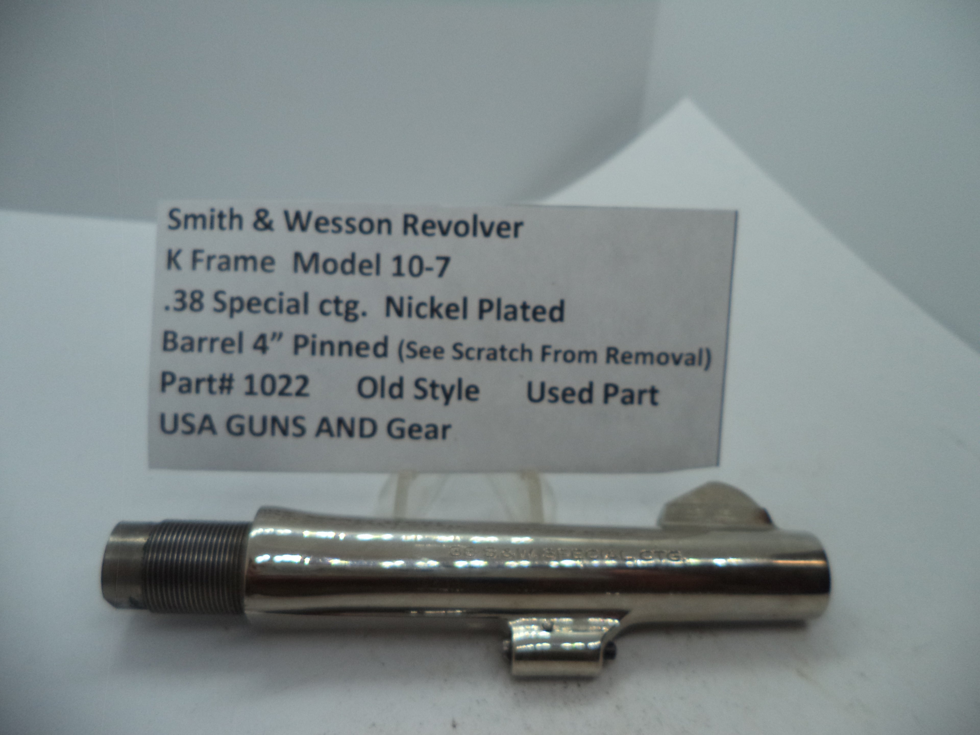Smith & Wesson revolver part labeled as K Frame Model 10-7, 4 inch pinned nickel plated .38 Special cartridge.