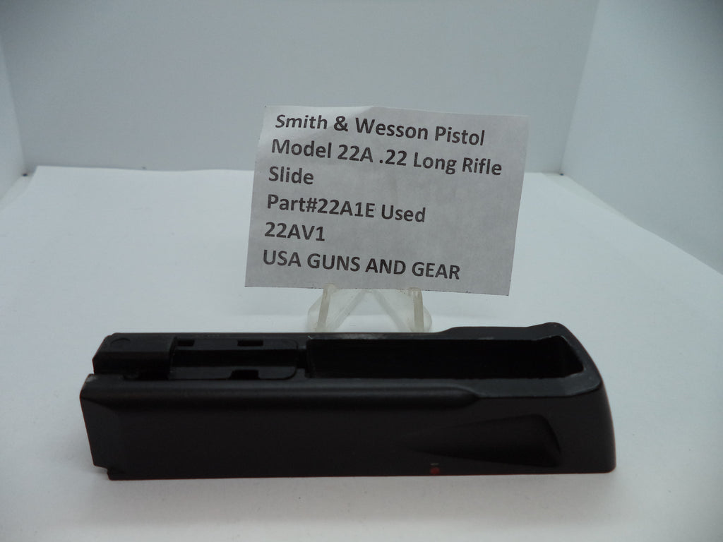 Smith & Wesson Pistol Model 22A Slide .22 Long Rifle used part displayed on a white stand with a label describing the product.