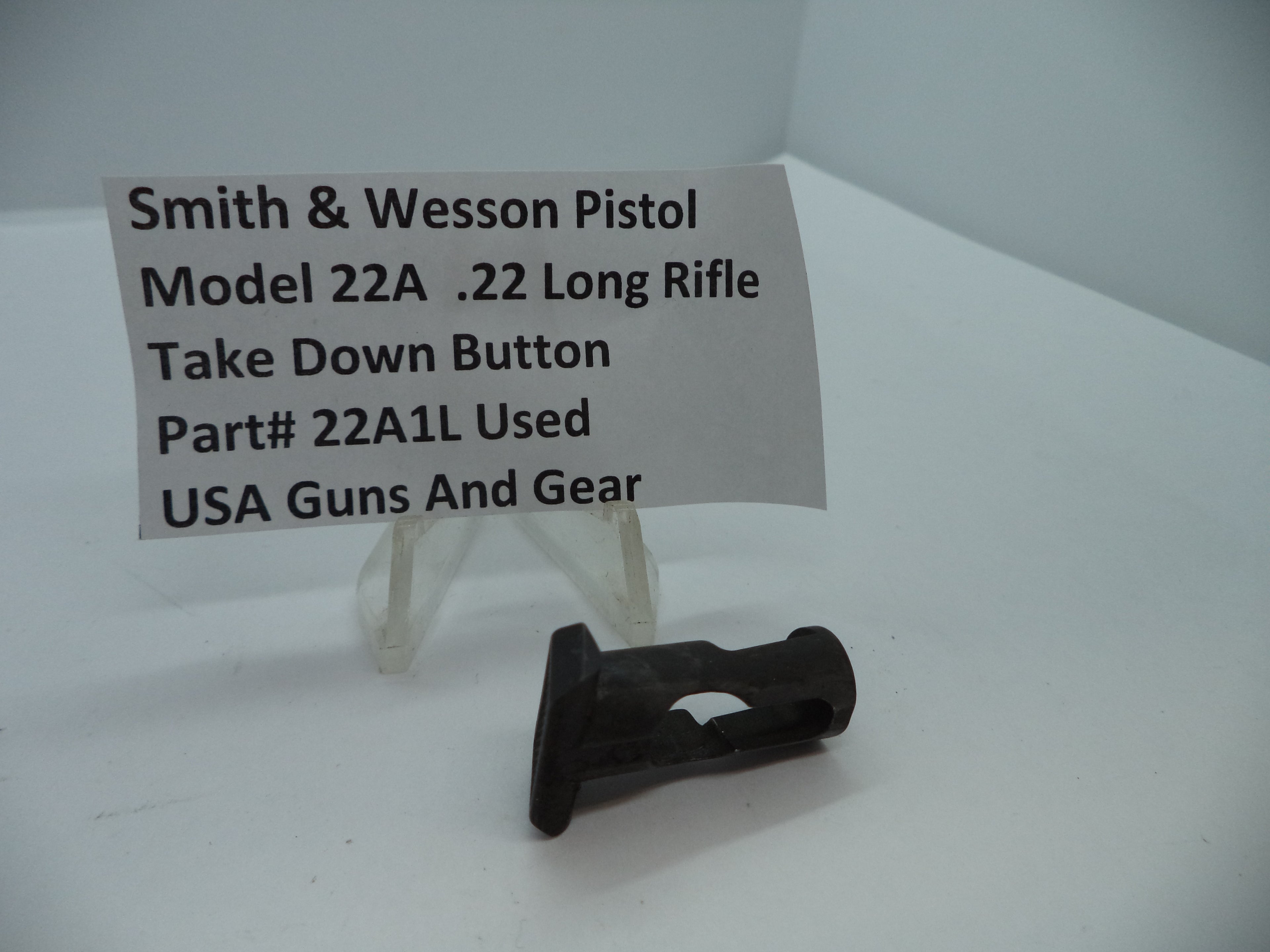 Smith & Wesson Pistol Model 22A Take Down Button for .22 Long Rifle displayed on a white card.