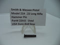 A .22 long rifle hammer pin for a Smith & Wesson Model 22A pistol, displayed on a white card with the product details, indicating it is a used part.