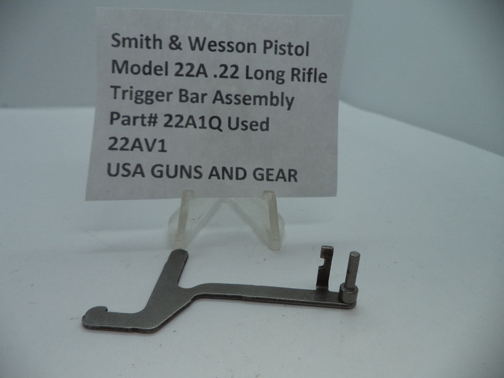 Smith & Wesson Pistol Model 22A Trigger Bar Assembly for .22 Long Rifle displayed on a white surface with a label providing product details.