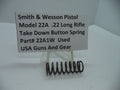 Smith & Wesson Pistol Model 22A Take Down Button Spring for .22 Long Rifle, used part displayed on a white stand with a label.
