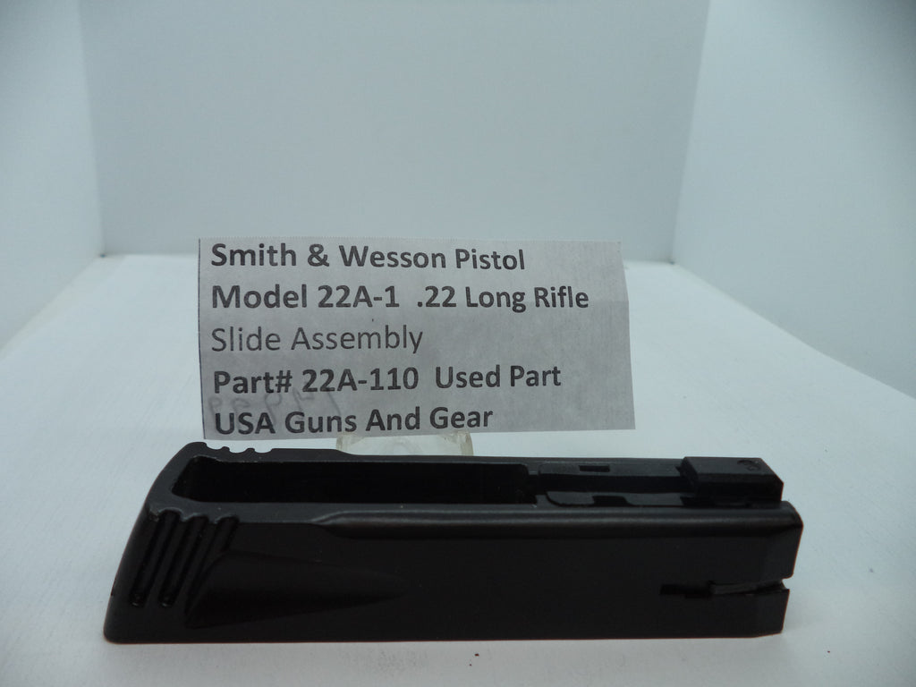 Smith & Wesson Pistol Model 22A-1 Slide Assembly for .22 Long Rifle displayed on a white background with a label containing product information.