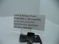 Smith & Wesson Model 22A-1 .22 Long Rifle Spring Plate Assembly, displayed on a white background with a descriptive label in front.
