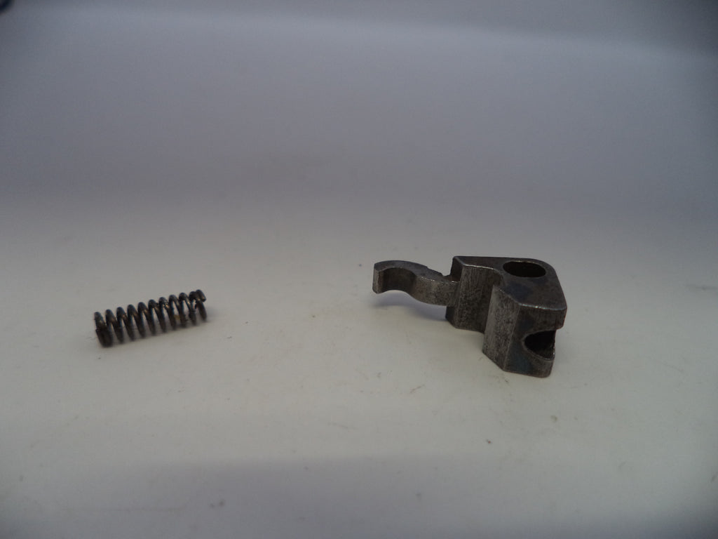 Metal spring and metal bracket on a white background