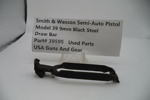 Smith & Wesson semi-auto pistol part on a white background with a label.