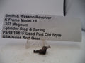 Smith & Wesson revolver cylinder stop and spring with descriptive label on a white background