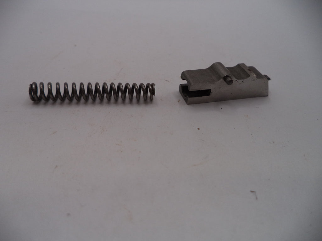 Metal spring and metal component on a white background