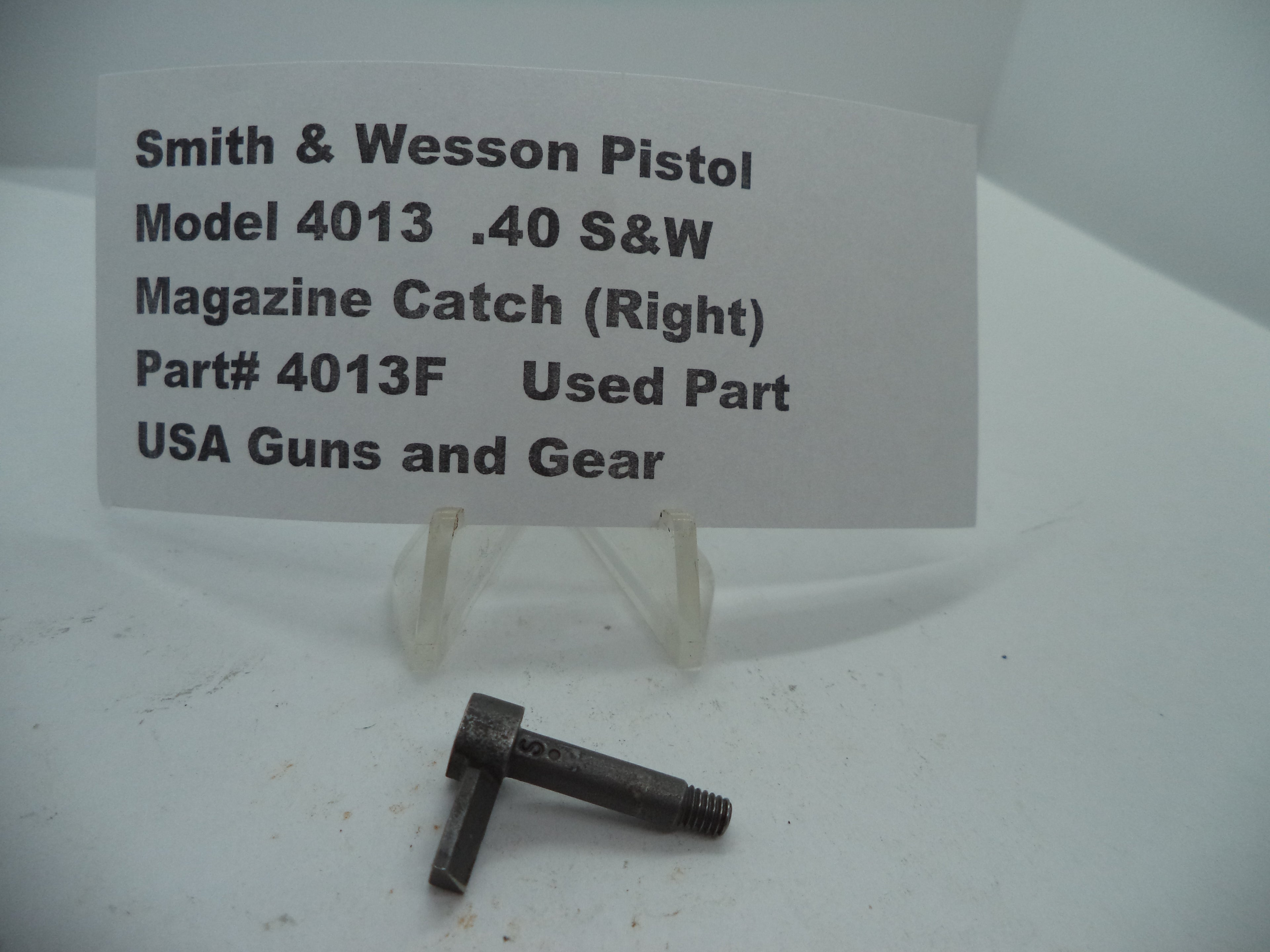 4013F Smith & Wesson Model 4013  .40 S&W  Magazine Catch (Right) Used Part
