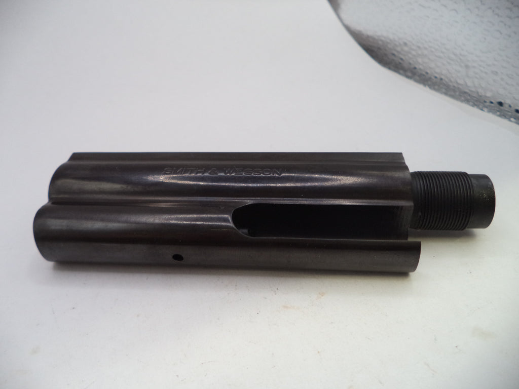 A dark metallic cylindrical metal component with a threaded end, photographed on a plain light background.