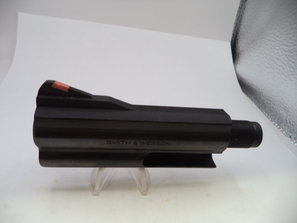 A black Smith & Wesson revolver slide, shown in profile on a clear plastic display stand against a white background.