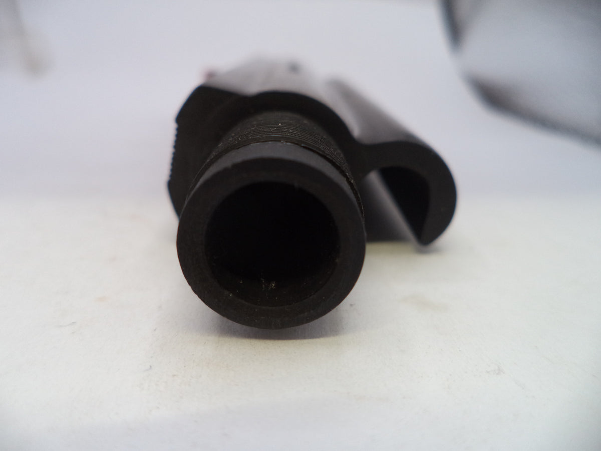 A close-up shot of a black cylindrical plastic component or nozzle tip with a textured inner wall and a curved black piece behind it, set against a plain white background.