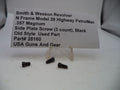 Three small black metal screws displayed in front of a white paper label that reads 'Smith & Wesson Revolver N Frame Model 28 Highway PatrolMan .357 Magnum Side Plate Screw (3 count), Black Old Style Used Part Part# 28160 USA Guns And Gear' on a white surface.