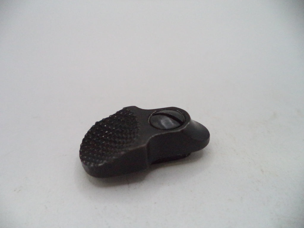 A small black textured plastic or rubber accessory with a circular opening, photographed on a plain light background.