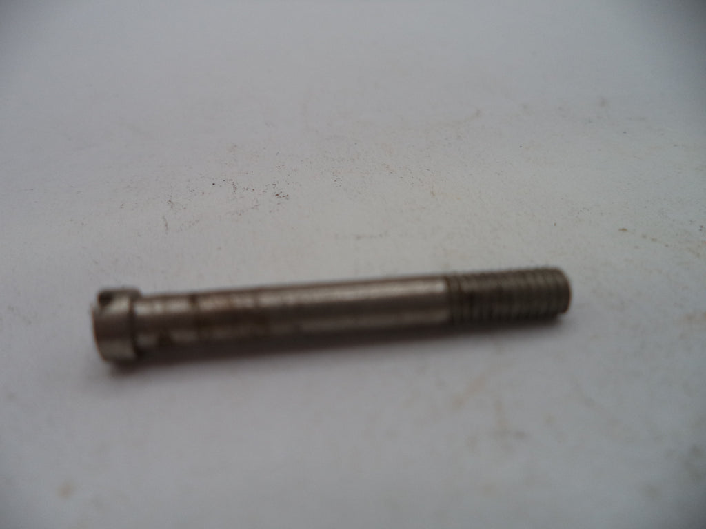 A small metal threaded bolt or pin with a cylindrical head, shown on a plain off-white surface.