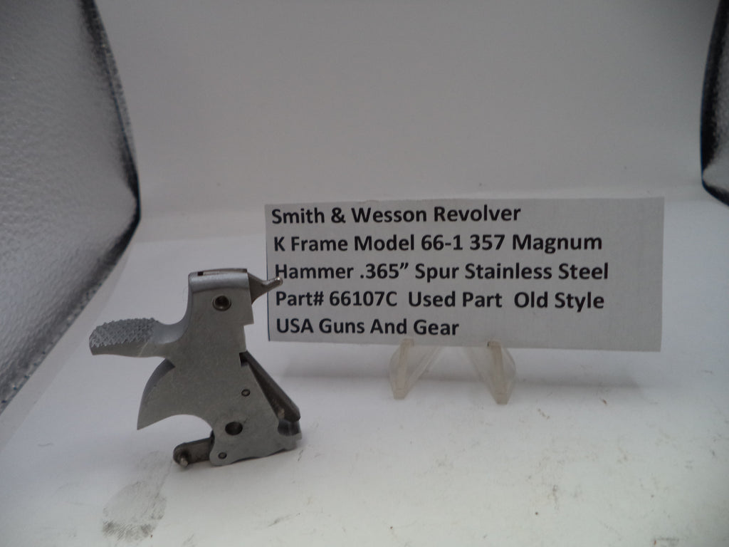 Smith & Wesson revolver part on a stand with a label