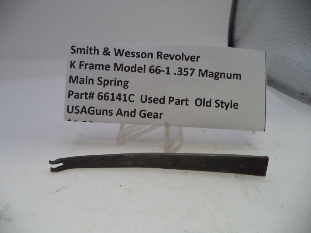 Smith & Wesson revolver main spring with a label on a white background
