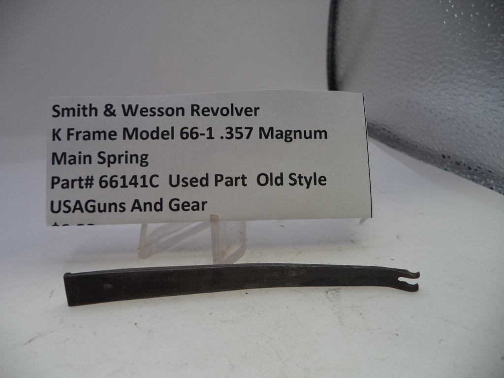Smith & Wesson revolver main spring with descriptive label on a white background