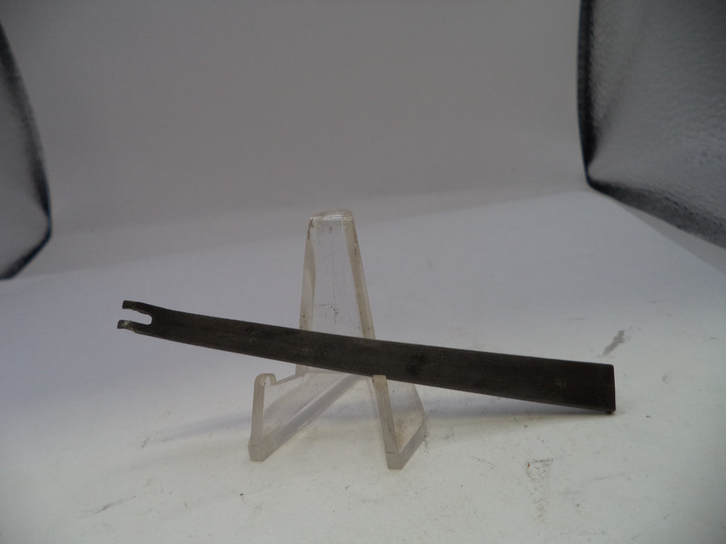 Metal bar on a clear stand against a white background