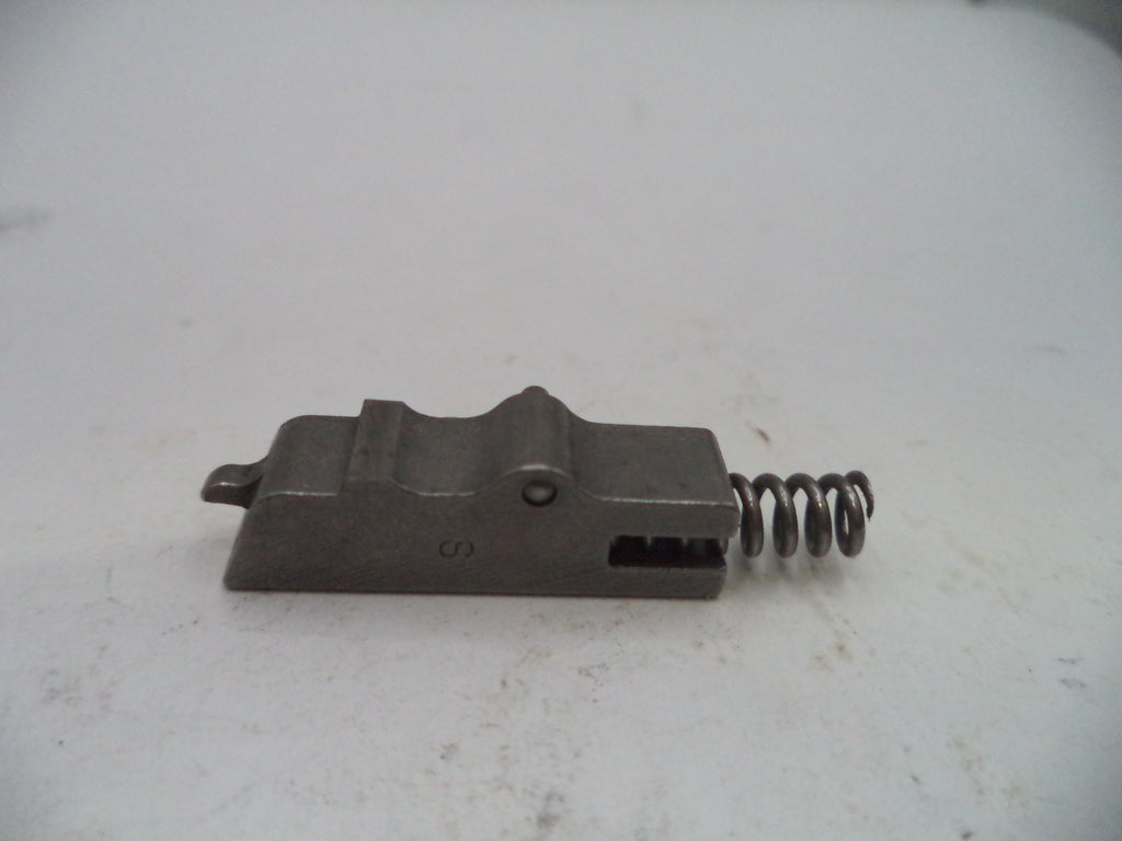Metal component with a spring on a white background