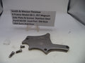 Smith & Wesson revolver K Frame Model 66-1 .357 Magnum side plate and screws on a white background with a label.
