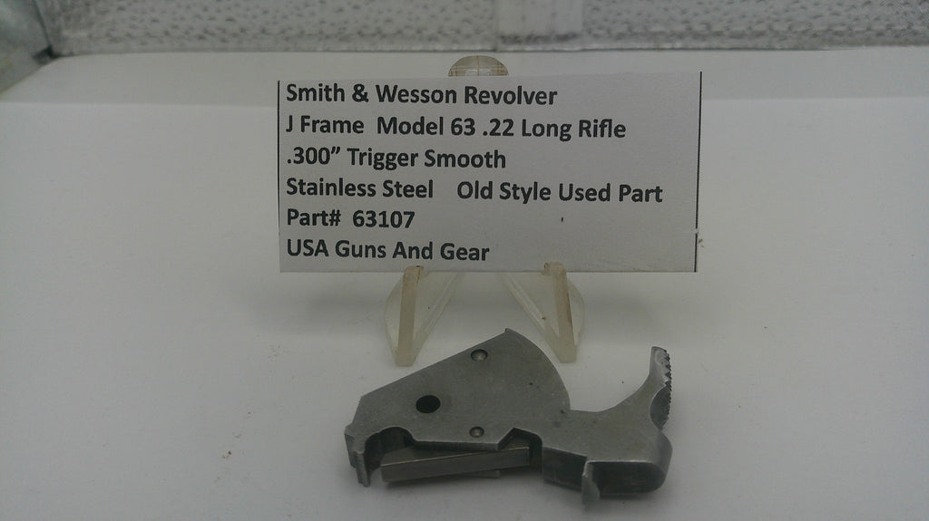Smith & Wesson revolver part on a white background with a label
