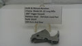 Smith & Wesson revolver part on a white background with a label