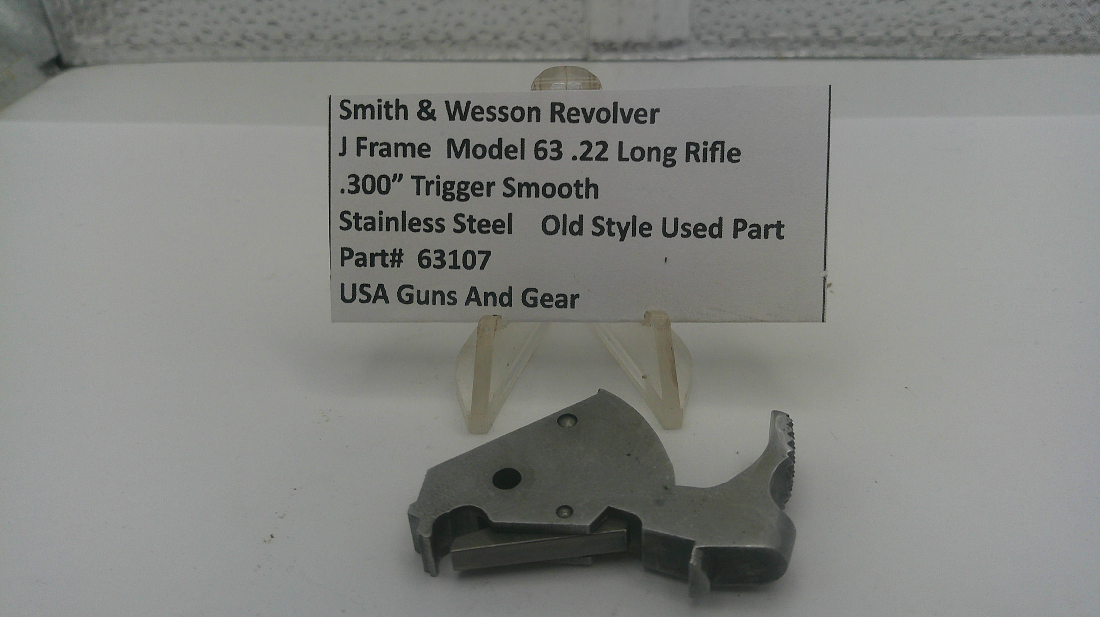 Smith & Wesson revolver part on a white background with a label