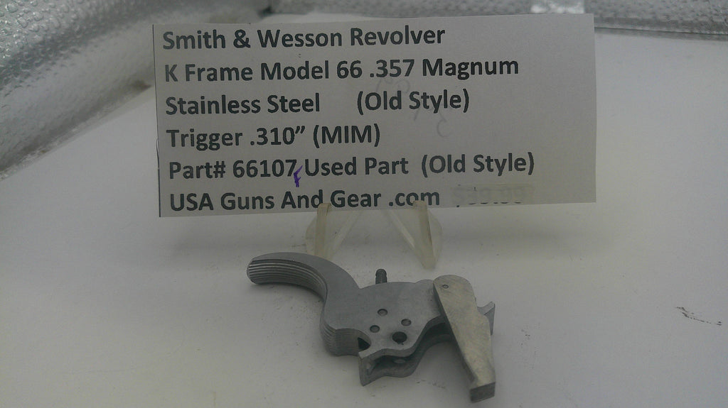 Smith & Wesson revolver trigger part with descriptive label on a white background