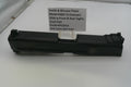 Smith & Wesson pistol slide on a white background with a label.